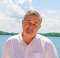 Mark Wortman with @properties Christie's International R.E. in MI advertising on BeachHouse.com